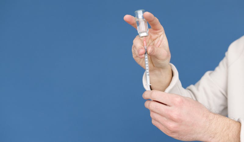 Drawing reconstituted peptide from a vial using an insulin syringe